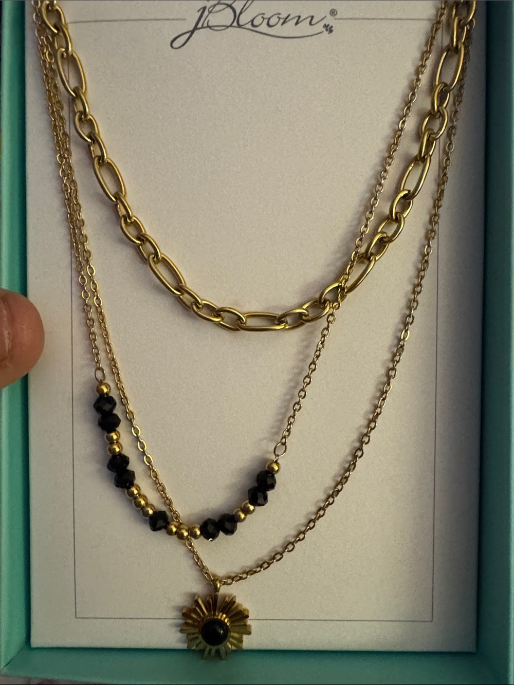 bloom Stainless Gold-Tone Layered Necklace with Black Beads and Sunburst Charm